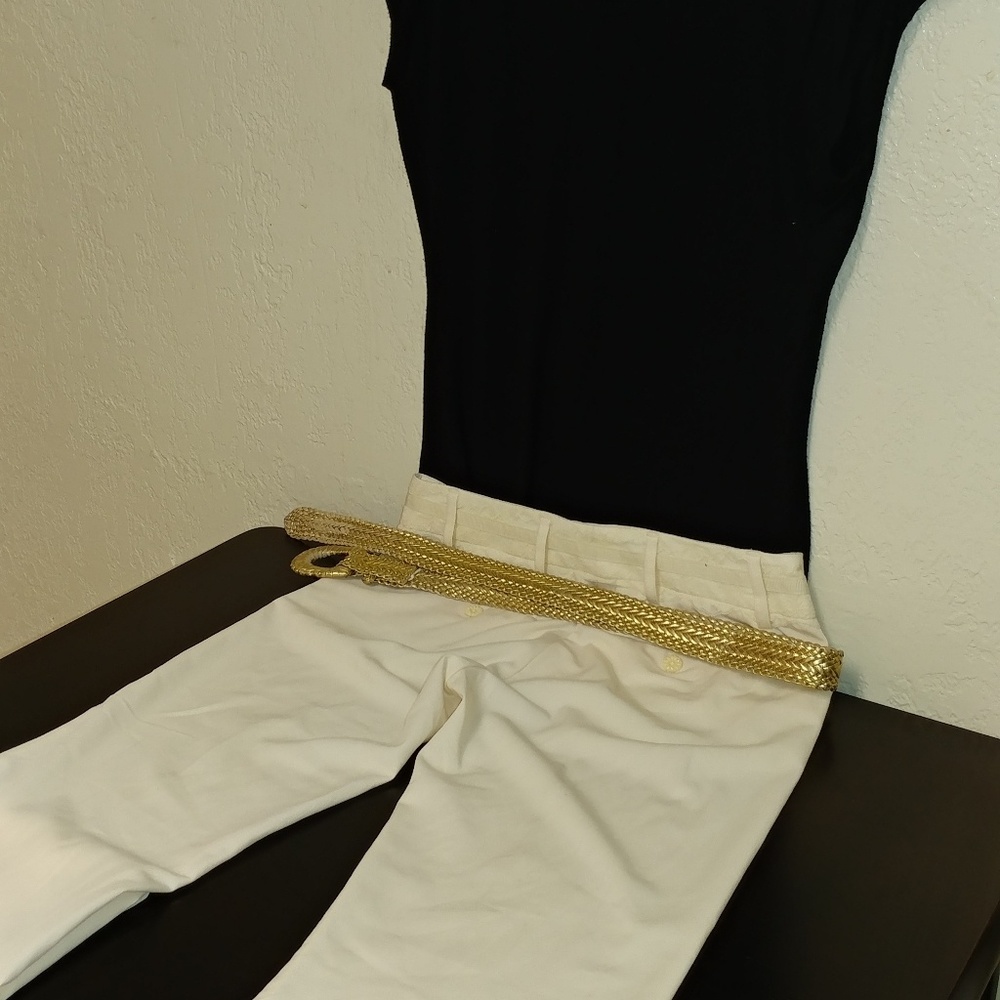 A pair of white woman's pants by Daisey Fuentes